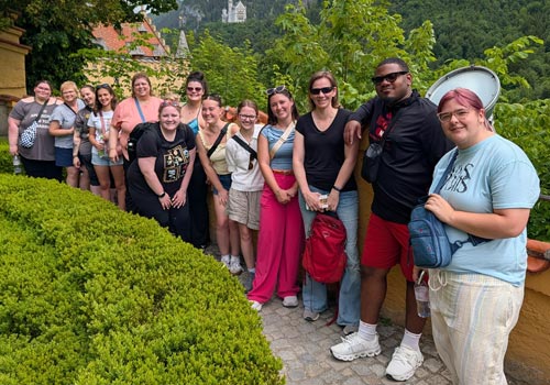 SCC Global Education students stand along a path in Greece.