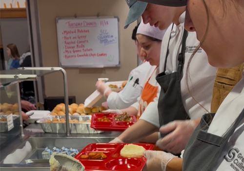SCC Culinary students serving a meal at Matt Talbot Kitchen & Outreach.